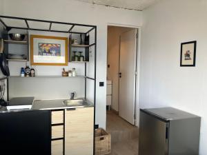 Η κουζίνα ή μικρή κουζίνα στο Ocean Studio