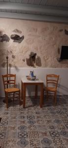 TV a/nebo společenská místnost v ubytování Cavo Paradise Livadaki Kimolos