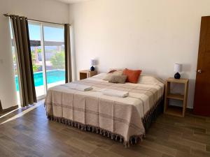 Postel nebo postele na pokoji v ubytování The Colony La Ventana