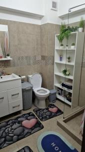 Koupelna v ubytování Solea Residence + 3 fotografie