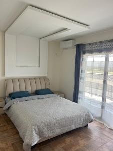 En eller flere senge i et værelse på Luxury residence