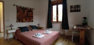 Postel nebo postele na pokoji v ubytování NaturAma