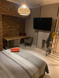 TV/trung tâm giải trí tại Suite Blanche +21 ảnh