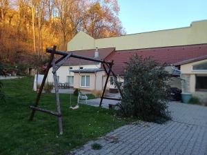 a swing set in the yard of a house at U kapličky, Boskovice in Boskovice