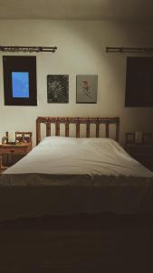 Ένα ή περισσότερα κρεβάτια σε δωμάτιο στο Athos Cape Traditional House