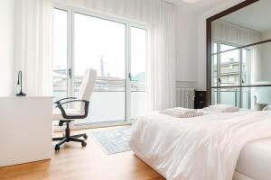 Ένα ή περισσότερα κρεβάτια σε δωμάτιο στο Casa Dela Cruz