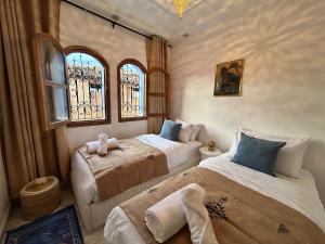 Ένα ή περισσότερα κρεβάτια σε δωμάτιο στο house in Chefchaouen