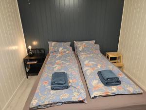 Ένα ή περισσότερα κρεβάτια σε δωμάτιο στο Senja Sjøtun House