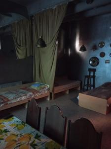 Postel nebo postele na pokoji v ubytování Шишкарівський