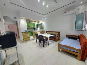 Kuchyň nebo kuchyňský kout v ubytování Rez-de-chaussée garage wifi 5Ggratuit gaz de ville