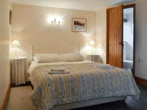 En eller flere senge i et værelse på Speke's Retreat - 18827