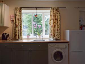 Kuchyň nebo kuchyňský kout v ubytování The Shippon