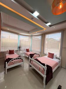 Postel nebo postele na pokoji v ubytování Chakiñan Hospedaje & Eventos