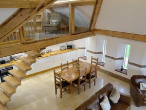 an overhead view of a dining room and kitchen in a loft at Coombe View in South Redworthy +10 photos