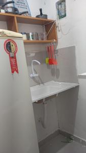 Køkken eller tekøkken på Suíte quase frente à rodoviária