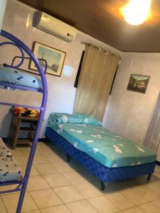 Ένα ή περισσότερα κρεβάτια σε δωμάτιο στο Havana Club