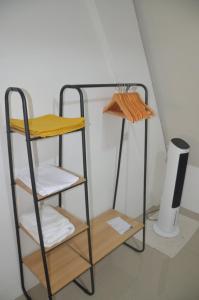 Ένα ή περισσότερα κρεβάτια σε δωμάτιο στο Toba-A-Scape