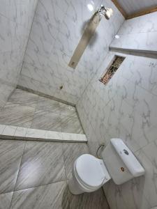 Koupelna v ubytování CFC Family Care Home