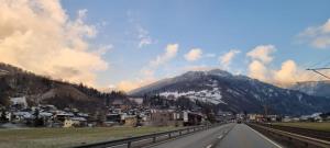 a view of a mountain from a highway at WEF Klosters Executive Apartment with Direct Train to Davos in Klosters +3 photos