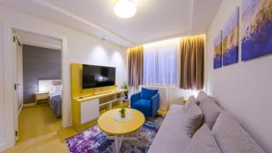 Μια τηλεόραση ή/και κέντρο ψυχαγωγίας στο Zepterme Apartman 408
