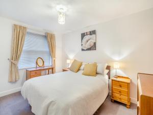 Ένα ή περισσότερα κρεβάτια σε δωμάτιο στο Olivet - Hewetson Court