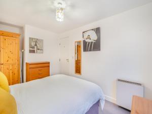 Ένα ή περισσότερα κρεβάτια σε δωμάτιο στο Olivet - Hewetson Court +11 φωτογραφίες