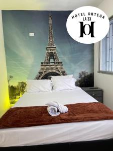 Ένα ή περισσότερα κρεβάτια σε δωμάτιο στο Hotel Ortega la 33