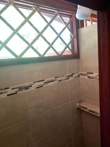 Ένα μπάνιο στο Charming 2-Person Apartment in Playa Chiquita, Puerto Viejo