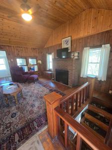 TV a/nebo společenská místnost v ubytování Lakefront Fun on Papakeechie | Kayaks & More! + 38 fotografií