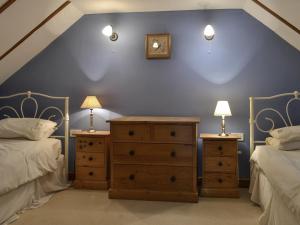 En eller flere senge i et værelse på Aunt Nell's Cottage - 18826