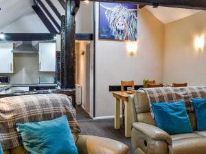 Et opholdsområde på Linney Cottage - Uk48986