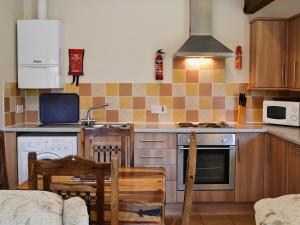 Η κουζίνα ή μικρή κουζίνα στο Oregano - E4483