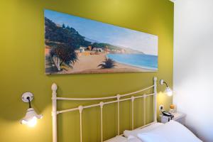 Postel nebo postele na pokoji v ubytování LC Boutique Hotel