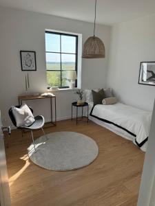 Postel nebo postele na pokoji v ubytování The Beam House