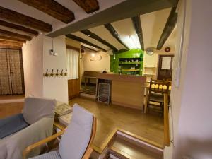 a living room with a couch and a table at Casa Narcís in Claverol
