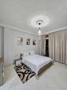 Ένα ή περισσότερα κρεβάτια σε δωμάτιο στο Sky View Tanger