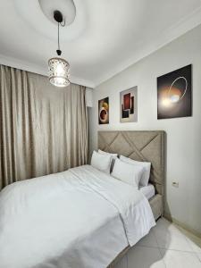 Ένα ή περισσότερα κρεβάτια σε δωμάτιο στο Sky View Tanger