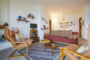 a living room with a couch and a table at Residenz Roccolo in Ghiffa