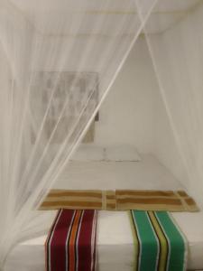 Postel nebo postele na pokoji v ubytování Imaa freedom house