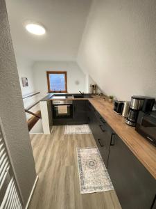 Kuchyň nebo kuchyňský kout v ubytování HarzRoots B