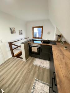 Kuchyň nebo kuchyňský kout v ubytování HarzRoots B + 13 fotografií