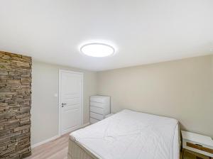 Ένα ή περισσότερα κρεβάτια σε δωμάτιο στο Aurora Bliss