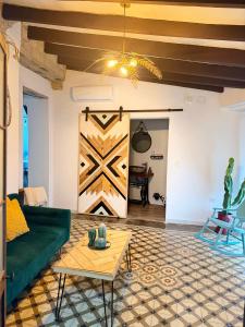 Et opholdsområde på Apartamento Boutique Kala Ático