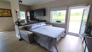 Ένα ή περισσότερα κρεβάτια σε δωμάτιο στο Il Cedro