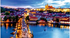 a view of a city with a river and buildings at Generali Hotel & Wellness in Prague