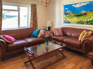 Posezení v ubytování Smithy Cottage