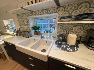 Kuchyň nebo kuchyňský kout v ubytování Bagargården 8 + 25 fotografií