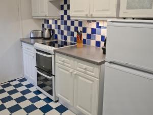 Η κουζίνα ή μικρή κουζίνα στο Camus Na Harry