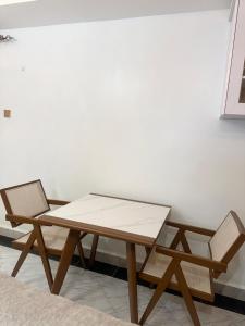 Χώρος καθιστικού στο A Cozy Apartment in Kampala, Ntinda