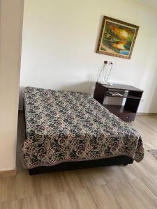 Ένα ή περισσότερα κρεβάτια σε δωμάτιο στο Chakrita São José